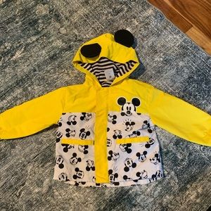 Disney kids raincoat. It has a zipper on the back for full containment